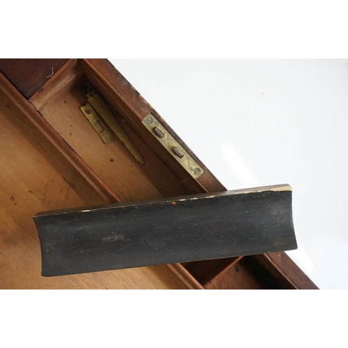 188 - An antique mahogany writing slope with brass fittings together with a wooden Chinese tray with brass... 