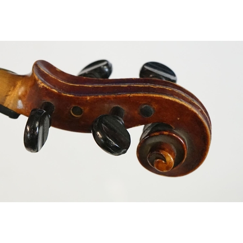 345 - A violin, two piece back, with hard case and bow.