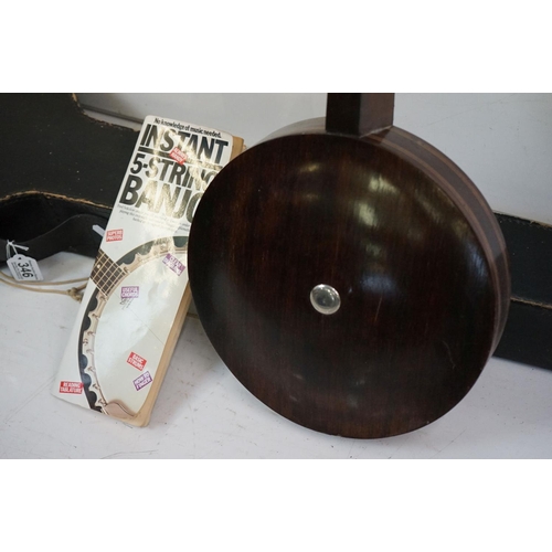 346 - A vintage Banjo, mother of pearl inlay, complete with case.