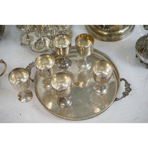 348 - A collection of mixed silver plate to include teapots, goblets, sugar bowl, coffee / water pot, egg ... 