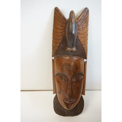 349 - A small collection of wooden African collectables to include a folding table and two masks and four ... 