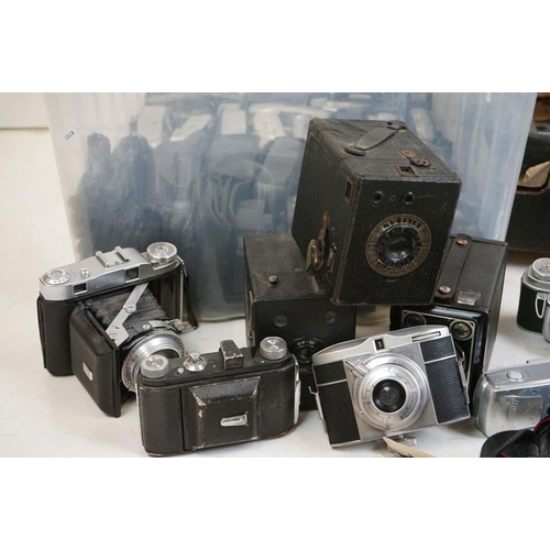 352 - A large collection of mixed cameras to include 35mm, 126, 127 formats.