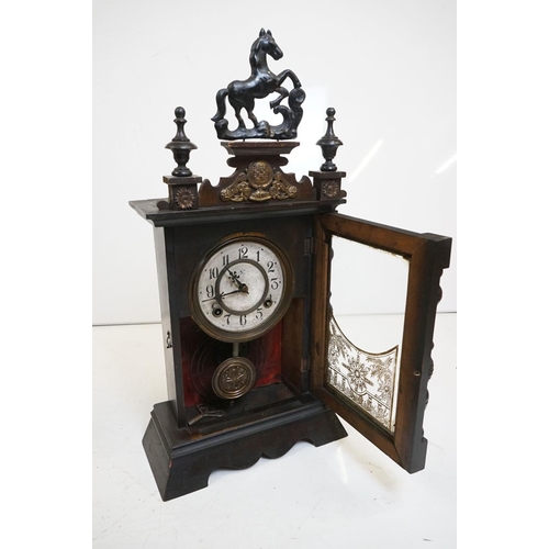 354 - A collection of six wooden cased mantle clocks contained within two boxes.