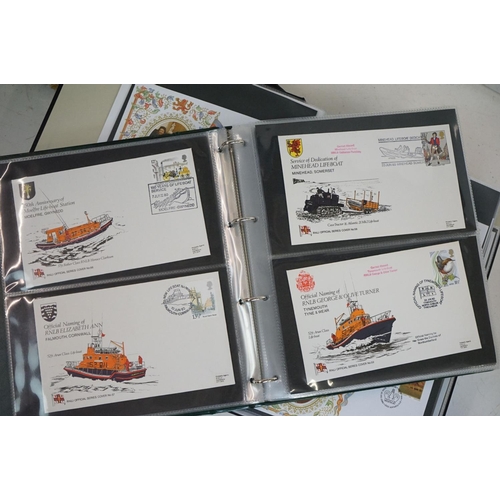 368 - A large collection of First Day Covers contained within four albums to include many railway & RNLI e... 