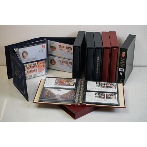 369 - A large collection of First Day Covers contained within four albums to include Princess Diana, Titan... 