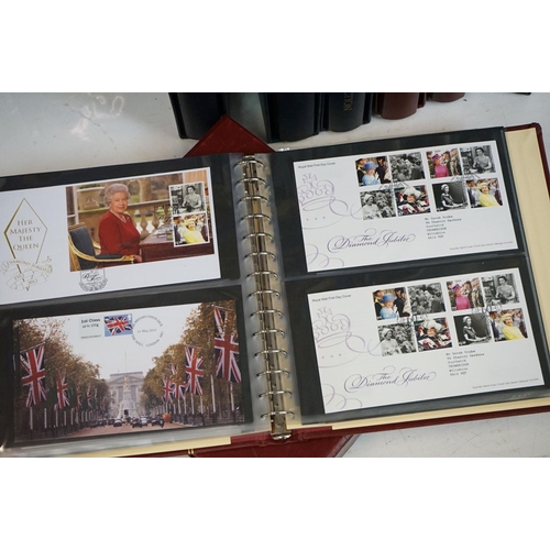 369 - A large collection of First Day Covers contained within four albums to include Princess Diana, Titan... 