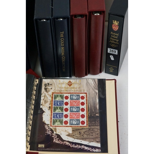 369 - A large collection of First Day Covers contained within four albums to include Princess Diana, Titan... 