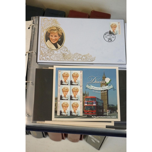 369 - A large collection of First Day Covers contained within four albums to include Princess Diana, Titan... 