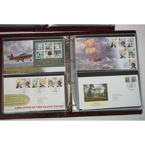 374 - A large collection of First Day Covers contained within fifteen albums to include WW2 aircraft and R... 