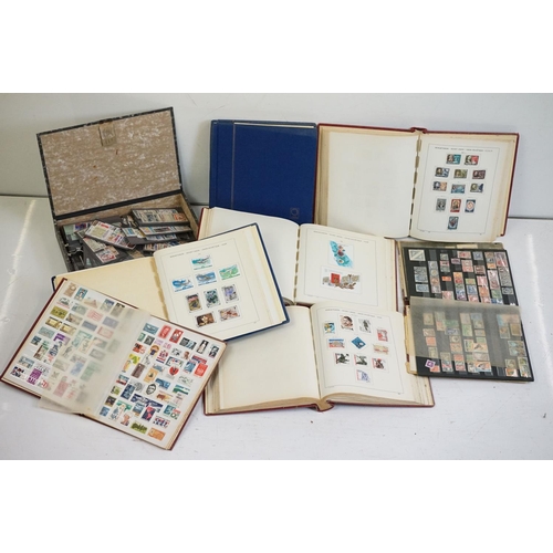 376 - A collection of British, Commonwealth and world stamps contained within seven albums together with a... 