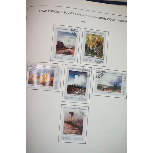 376 - A collection of British, Commonwealth and world stamps contained within seven albums together with a... 