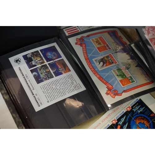 376 - A collection of British, Commonwealth and world stamps contained within seven albums together with a... 