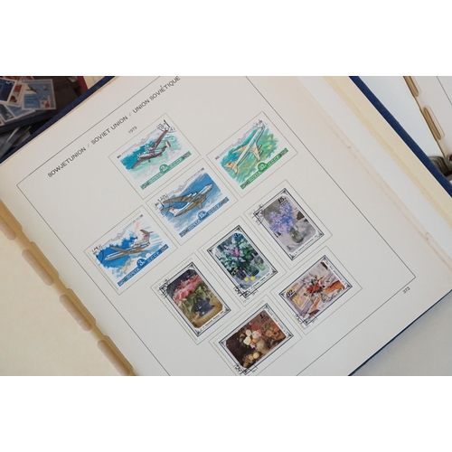 376 - A collection of British, Commonwealth and world stamps contained within seven albums together with a... 