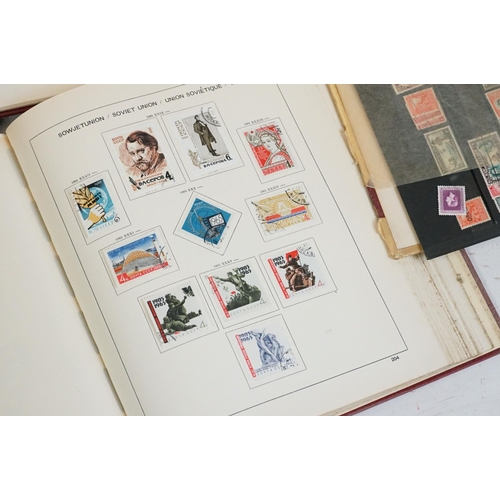 376 - A collection of British, Commonwealth and world stamps contained within seven albums together with a... 