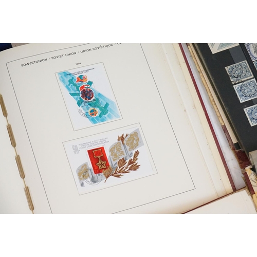 376 - A collection of British, Commonwealth and world stamps contained within seven albums together with a... 