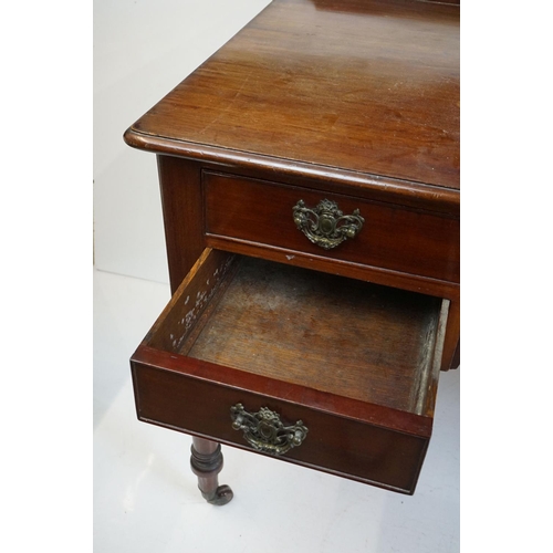 475 - 19th century Mahogany Writing Desk with an arrangement of four drawers flanking a central kneehole r... 