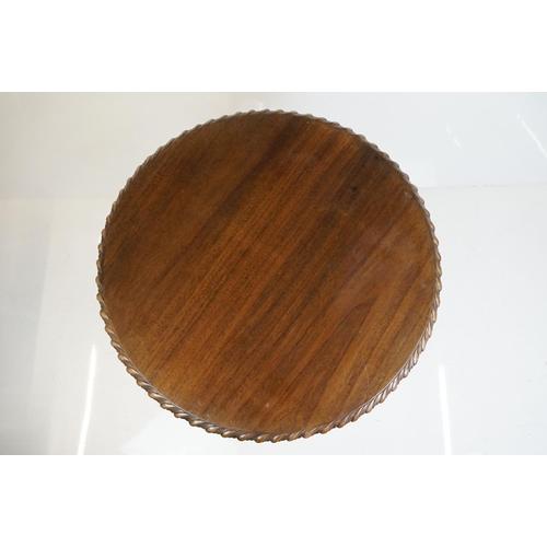 477 - Mahogany Circular Tilt Top Table in the George III style with birdcage mechanism raised on a turned ... 