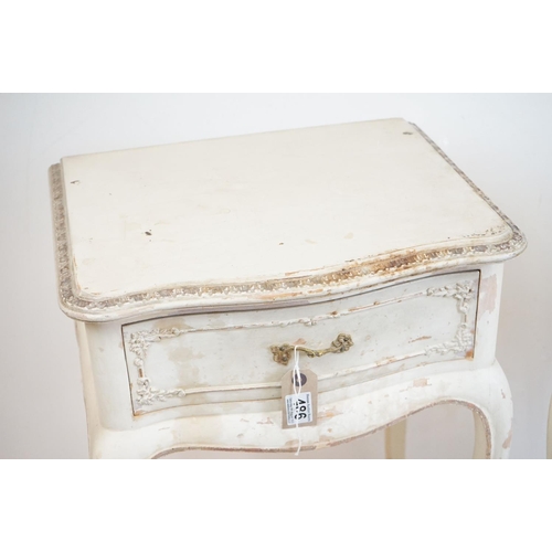 486 - Pair of French style Cream Painted Bedside Cabinets with moulded floral detail, each with a single d... 