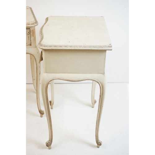 486 - Pair of French style Cream Painted Bedside Cabinets with moulded floral detail, each with a single d... 