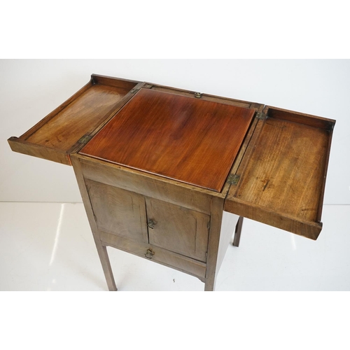 491 - George III Mahogany Washstand, the square top opening to a lift-up mirror and recesses for a wash se... 