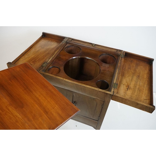 491 - George III Mahogany Washstand, the square top opening to a lift-up mirror and recesses for a wash se... 