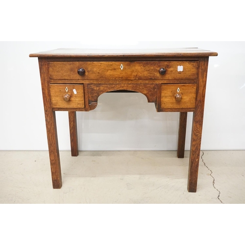 495 - George III Oak Lowboy or Side Table, with an arrangement of three drawers and shaped apron, raised o... 