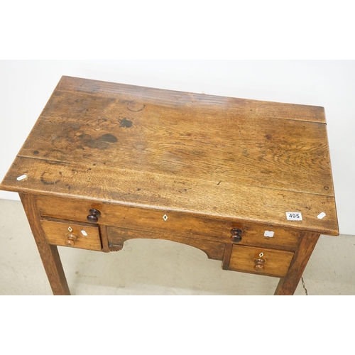 495 - George III Oak Lowboy or Side Table, with an arrangement of three drawers and shaped apron, raised o... 