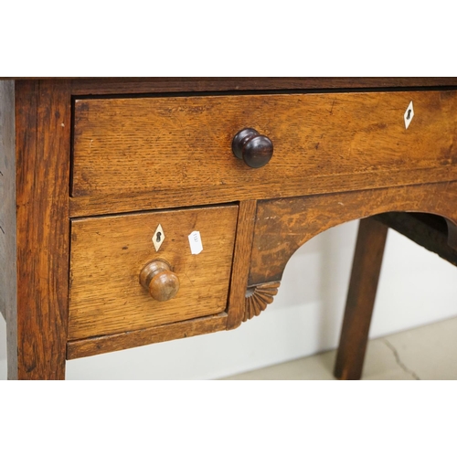 495 - George III Oak Lowboy or Side Table, with an arrangement of three drawers and shaped apron, raised o... 