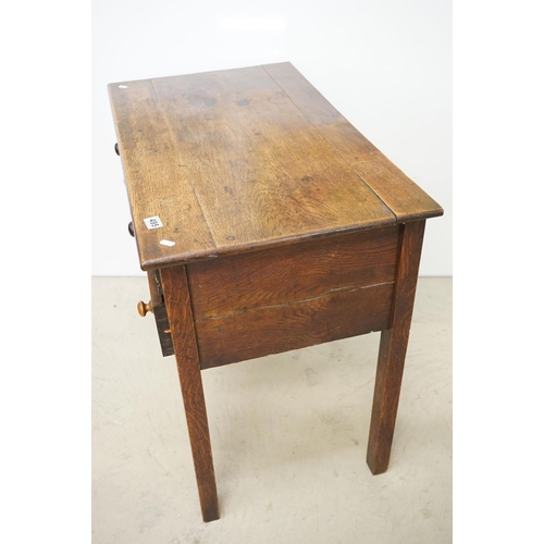 495 - George III Oak Lowboy or Side Table, with an arrangement of three drawers and shaped apron, raised o... 