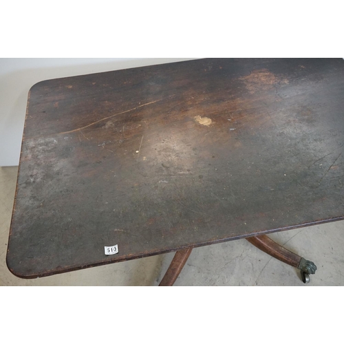 510 - Early 19th century Mahogany Rectangular Tilt Top Dining Table raised on turned pedestal with four sw... 