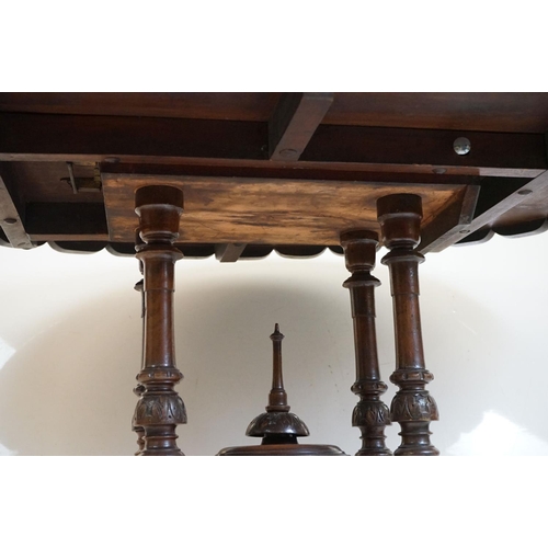 513 - Victorian Burr Walnut Oval Tilt Top Loo Table raised on four turned supports and four carved legs wi... 