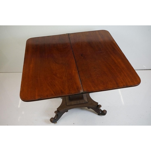 534 - William IV Mahogany Fold-over Tea Table, the top with rounded corners over a frieze flanked by leaf ... 