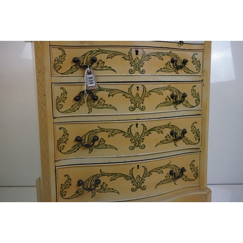 539 - Serpentine fronted Chest of Four Long Drawers in the George III style, with brushing slide, mustard ... 