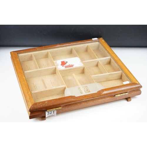 321 - A Willem II dutch cigar counter top display box with hinged glass lid.