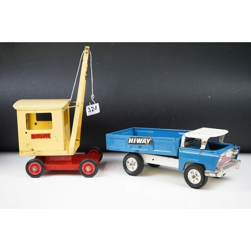 324 - Two 1960's / 70's sheet metal vehicles to include a Sutcliffe crane and a Hi-Way truck.