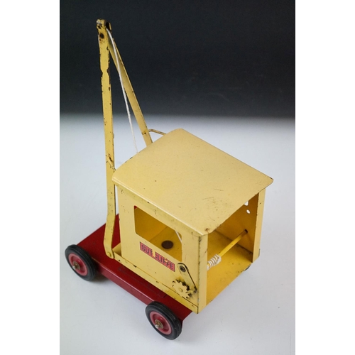 324 - Two 1960's / 70's sheet metal vehicles to include a Sutcliffe crane and a Hi-Way truck.