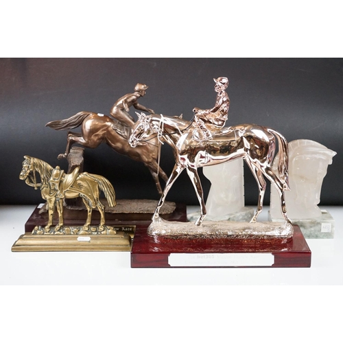 326 - Two horse racing trophies together with a brass door stop in the form of a horse and a pair of horse... 