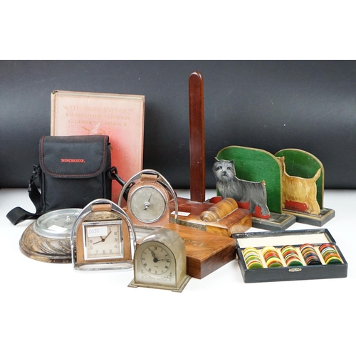 327 - A box of mixed collectables to include three desk clocks, barometer, gaming counters, letter racks, ... 