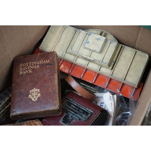 328 - A box of mixed collectables to include a mid 20th century first aid kit, vintage model rail, camera,... 