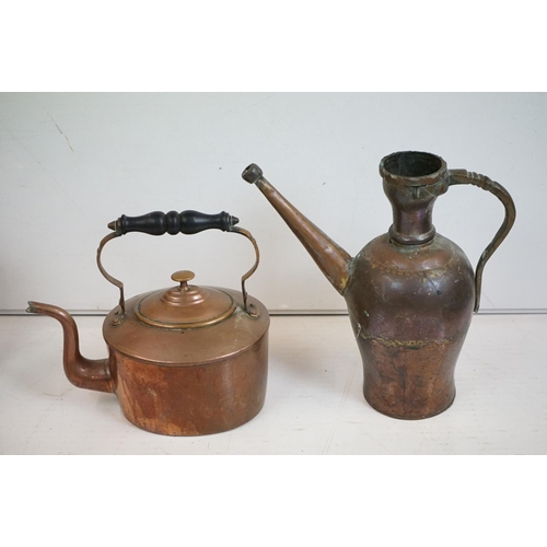 329 - A collection of mixed metalware to include a copper jug, copper kettle, brass trivet, kitchen scales... 