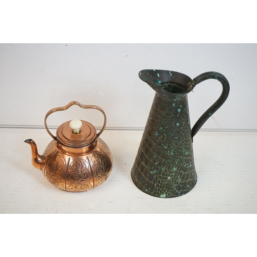 329 - A collection of mixed metalware to include a copper jug, copper kettle, brass trivet, kitchen scales... 