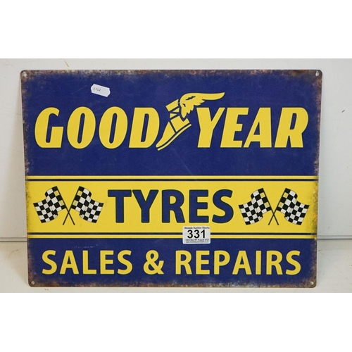 331 - A Goodyear tyres sales and repairs enamel sign together with a Cuprinol metal container and a Havoli... 