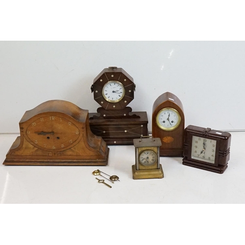 336 - Five mantel and carriage clocks, 4 wood, one brass, one bakelite.