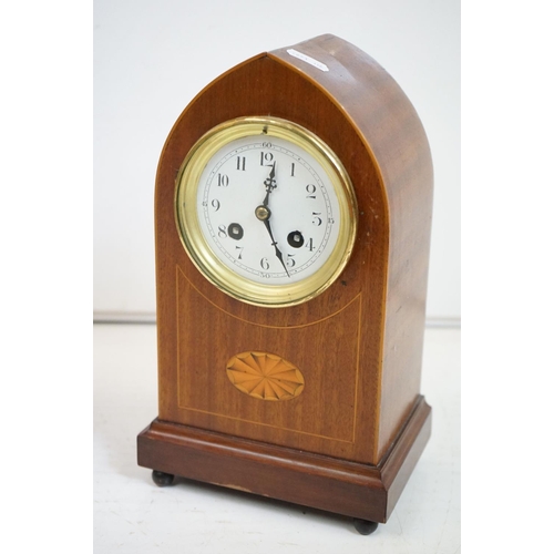 336 - Five mantel and carriage clocks, 4 wood, one brass, one bakelite.