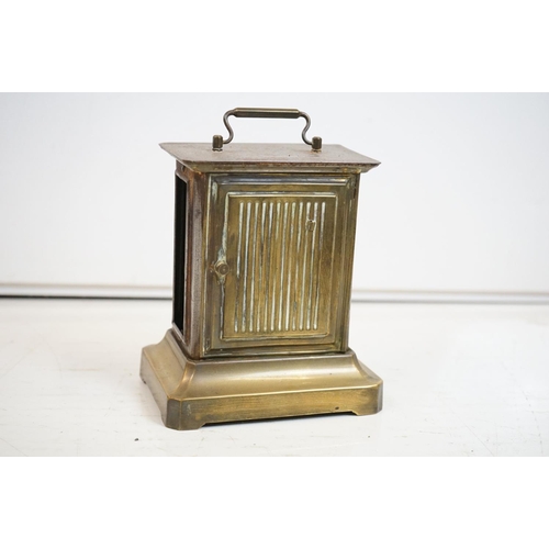 336 - Five mantel and carriage clocks, 4 wood, one brass, one bakelite.