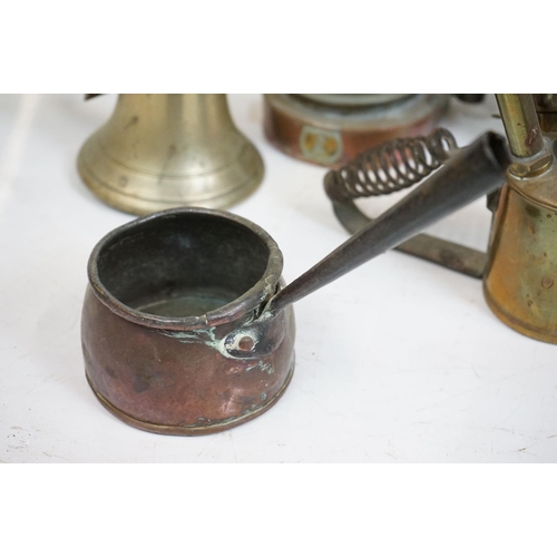 340 - A collection of mixed metalware to include a ship lamp, miners lamps, copper jug, barometer, bell, g... 