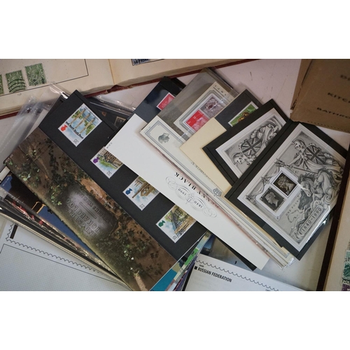 356 - A large collection of British and world stamps, mostly within albums to include First Day Covers And... 