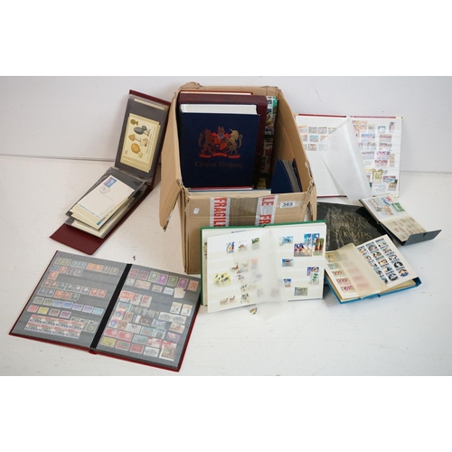 365 - A large collection of mainly World and Commonwealth stamps contained within albums, to include mint ... 