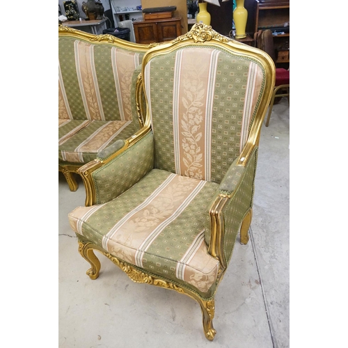 502 - Louis XV style Carved Gilt Wood Three Piece Suite comprising a three seater settee (230cm long x 113... 