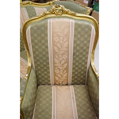 502 - Louis XV style Carved Gilt Wood Three Piece Suite comprising a three seater settee (230cm long x 113... 